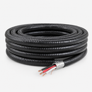 14/3 TECK90 armoured copper cable coiled on a pale white background with black, red, and white insulated conductors and bare copper ground exposed