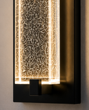 Close-up detail image of 18-inch LED crystal bubble glass outdoor wall sconce showing illuminated acrylic bubble diffuser, black aluminium frame and warm architectural LED lighting effect.