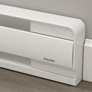 Close-up of Stelpro Brava B2002W white electric baseboard heater showing rounded corner design