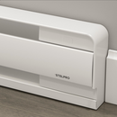 Close-up of Stelpro Brava electric baseboard heater rounded corner and white steel finish